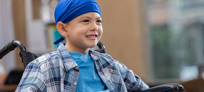 Pediatric Trauma Center / boy with cancer in a wheelchair