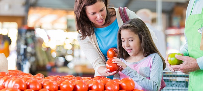 Image of mother and daughter shopping for healthy food