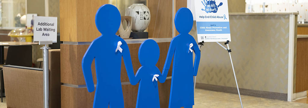 blue figures at entrance